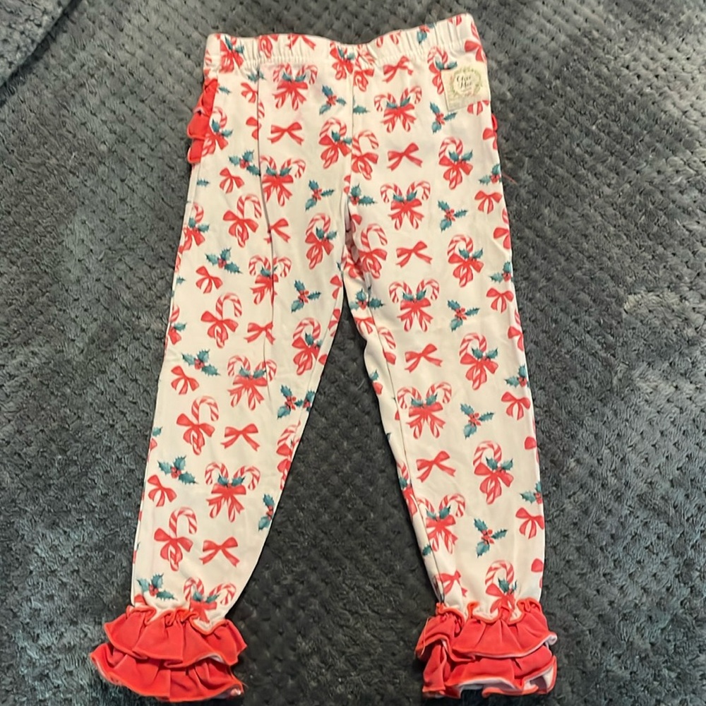 Olive Mae cute candy cane leggings.